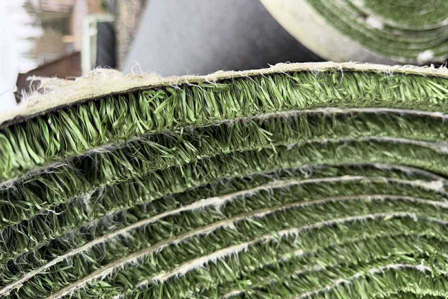 rohelise tennisemuru rull külgvaade Rohelise tennisemuru rull külgvaade